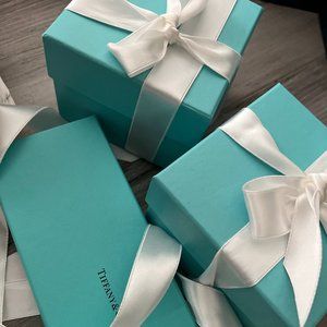 THREE BOXES FROM TIFFANY AND CO! :)